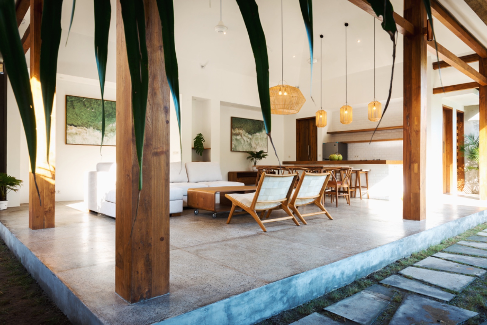 Open-plan villa living, opening to the garden
